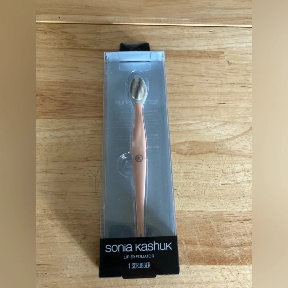 Sonia Kashuk lip exfoliator. Pink in color. New in box